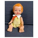 Two Vintage Vinyl Dolls - Red-Haired Floral Dress Doll & Orange-Haired Yellow Romper Doll