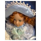 LR - Three Collectible Dolls in Pastel Lace Dresses with Display Cases