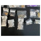 Assorted Jewelry Making Supplies with Leather Connectors, Clasps, and Cord Spools