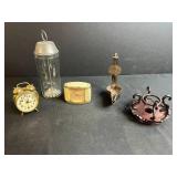Collection of Vintage Table Clocks, Open Pan Oil Lamps, Glass Mixer, and Carved Wooden Stand