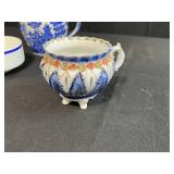 Assorted Decorative Blue and White Ceramic Lot with Creamer, Sugar Bowl, and Dutch Tiles Inc McClaine