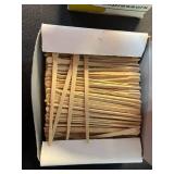 Collection of Wooden Craft Sticks, Sandwich Picks, Pipe Cleaners, and Disposable Aprons