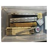 Collection of Scissors, Folding Rulers, and Measuring Tools