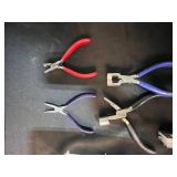 Lot of Assorted Specialty Pliers, Washers, and Metal Rings with Storage Bin