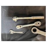 Collection of Mixed Wrenches, Ratchets, and Sockets with Storage Bin