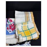 Vintage Woven Picnic Basket with Assorted Retro Table Linens