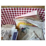 Vintage Handkerchief and Linen Collection with Basket, Flour Sack Apron, and Wooden Wine Holder
