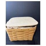 Vintage Handkerchief and Linen Collection with Basket, Flour Sack Apron, and Wooden Wine Holder