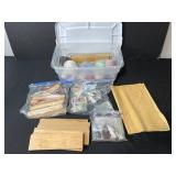Craft Supplies Lot with Wood Pieces, Fabric, Beads, and Accessories in Storage Bin