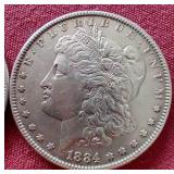 (2) 1884 Morgan Dollars