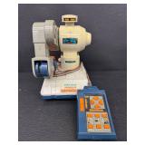 Vintage Radio Shack Armatron Mobile Robot and Robotic Banker Coin Bank Set