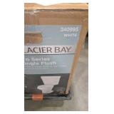 Glacier Bay 12 inch Rough In Two-Piece 1.28 GPF Single Flush Round Toilet in White Seat Included