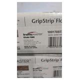 TrafficMaster Khaki Oak 4 MIL x 6 in. W x 36 in. L Grip Strip Water Resistant Luxury Vinyl Plank Flooring (1752 sqft)