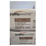 TrafficMaster Khaki Oak 4 MIL x 6 in. W x 36 in. L Grip Strip Water Resistant Luxury Vinyl Plank Flooring (1752 sqft)