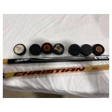 Hockey Sticks and Pucks Lot