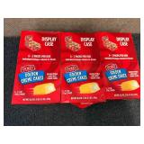 3 Display Cases Of Dolly Golden Crme Cakes