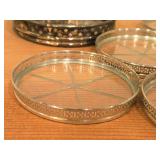 (6) Webster Co. American Art Sterling Silver and Glass Coasters, (1) Silverplated Wine Bottle Coaster