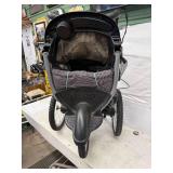 THREE WHEELED STROLLER