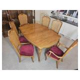 Elegant French Provincial Dining Table with Cane-Back Chairs