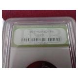 (2) Slabbed Kennedy Half Dollars