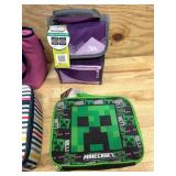 Assorted lunch boxes and totes