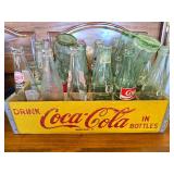 Vintage Coke Bottles in a Coke Box