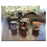 Collection of 7 Assorted Holiday and Novelty Mugs with Bottle