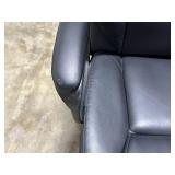 Black Faux Leather Office Chair with Adjustable Armrests and Casters