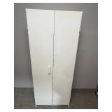 Tall White Storage Cabinet with Assorted Household Supplies