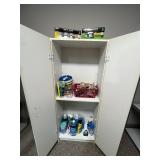 Tall White Storage Cabinet with Assorted Household Supplies