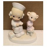 Precious Moments Figurine "love beareth all things" Item#E-7158