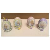Precious Moments set of 4 annual easter egg 1997, 2000,2001, and 2002