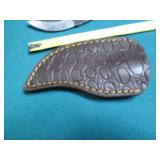 Hand crafted knife with a leather s...