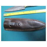 Hand crafted knife with a leather s...