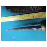 Hand crafted knife with a leather s...