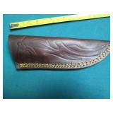 Hand crafted knife with a leather s...