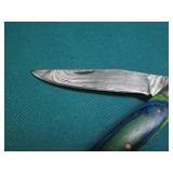 Hand crafted pocket knife with a le...