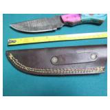 Hand crafted knife with a leather s...