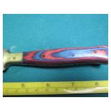 Hand crafted knife with a leather s...