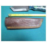 Hand crafted knife with a leather s...