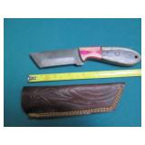 Hand crafted knife with a leather s...