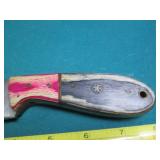 Hand crafted knife with a leather s...