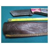 Hand crafted knife with a leather s...