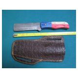 Hand crafted knife with a leather s...