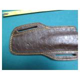 Hand crafted knife with a leather s...