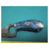 Hand crafted knife with a leather s...