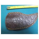 Hand crafted knife with a leather s...