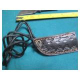Small Hand crafted knife with a lea...