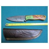Hand crafted knife with a leather s...