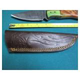Hand crafted knife with a leather s...
